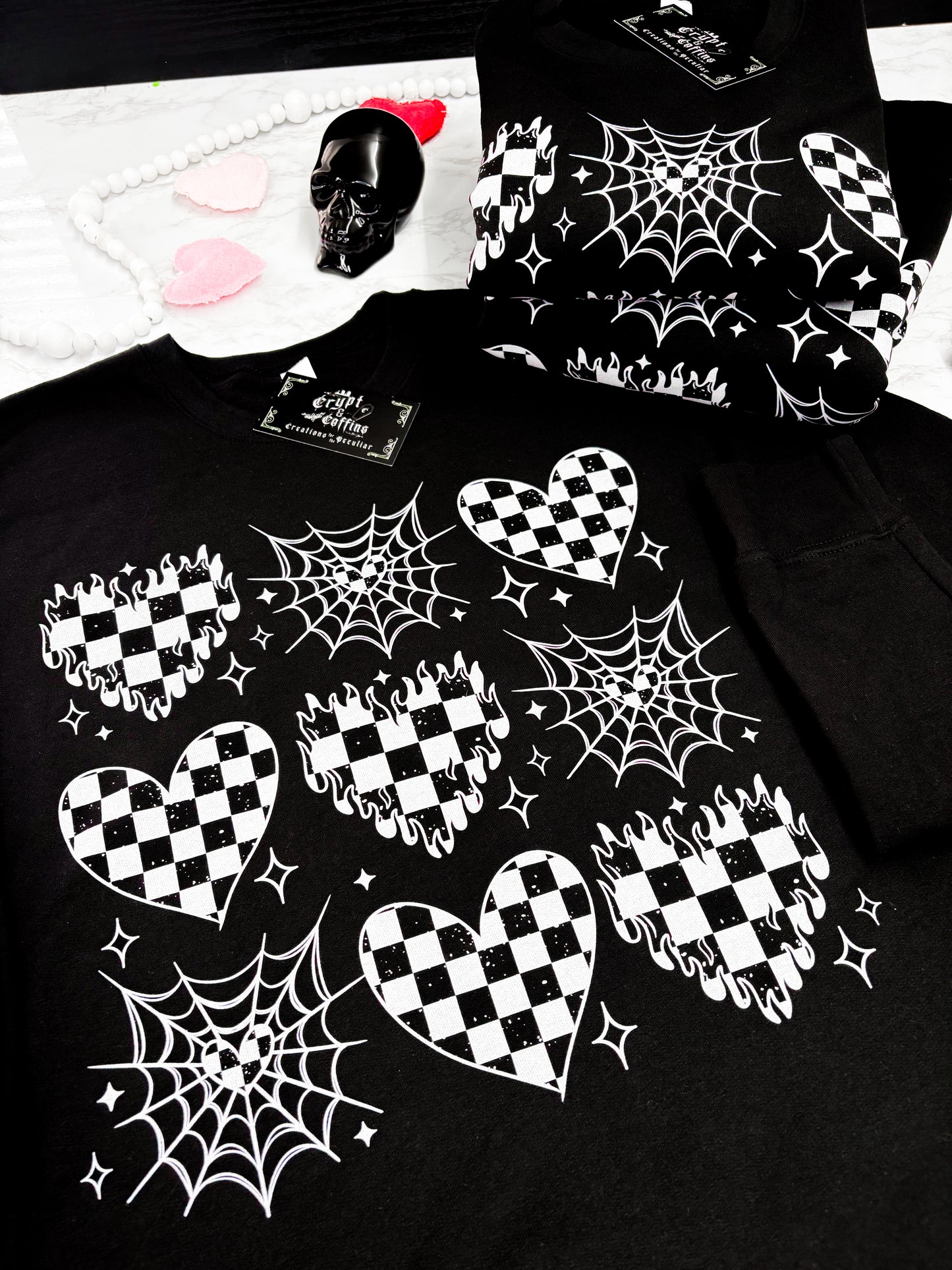 Checkered Web Hearts - White + Black | Black Crewneck Sweater