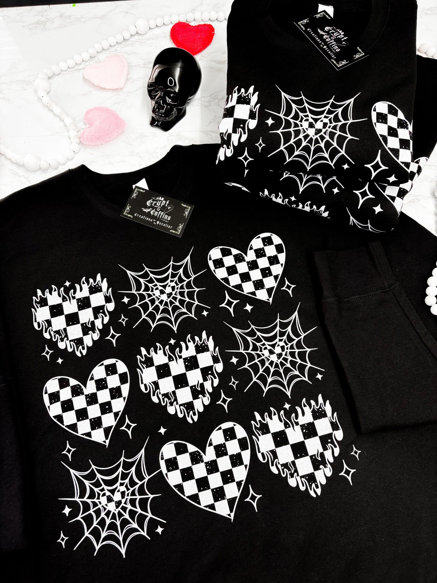 Checkered Web Hearts - White + Black | Black Crewneck Sweater